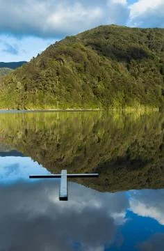 Reflection of salvation cross Stock Photos