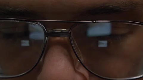 Reflection of A Screen in Man's Glasses - Close-Up FHD Stock Footage 143165107