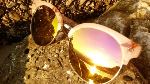 The reflection of the sea in sunglasses Stock Footage 69221383