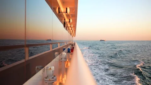 Reflection of the sea in the yacht window at sunset Stock Footage 251258334