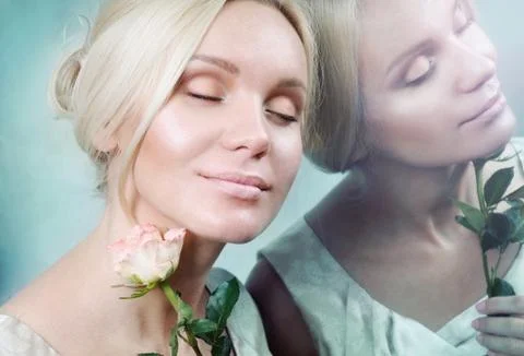 Reflection of sensual tender elegance young woman in the mirror Stock Photos