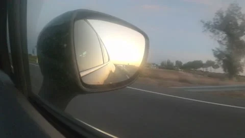Reflection in side view mirror, long-distance mirror of the automobile Stock Footage 161823402