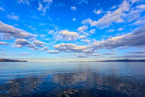 The reflection of the sky and clouds in the water Stock Photos