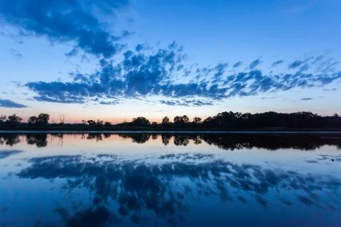 Reflection of the sky in the river Stock Photos