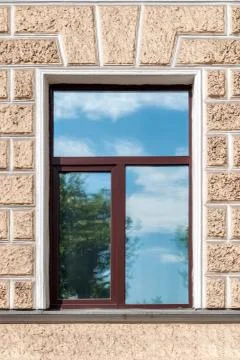 Reflection of the sky in the window. Stock Photos