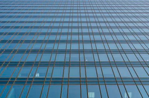 Reflection of the sky in the windows of a building. Perspective and underdite Stock Photos