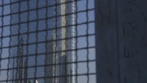 Reflection of a skyscraper in another Stock Footage 71319141