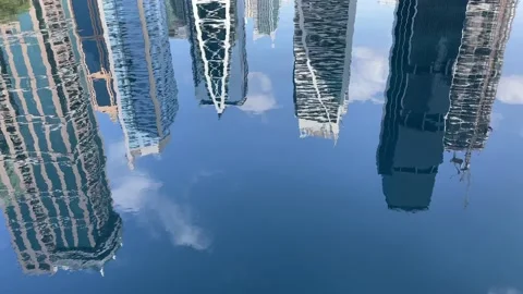 Reflection of the skyscraper buildings in the water Stock-Footage 221390346