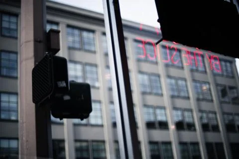 Reflection of "By the Slice" sign Foto stock