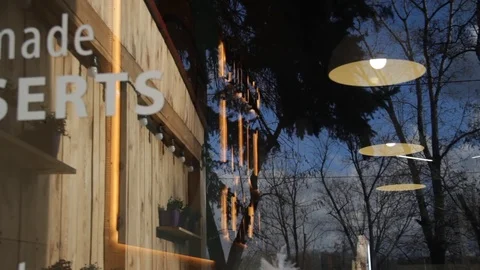 Reflection of a street in a cafe window Stock Footage 74868617