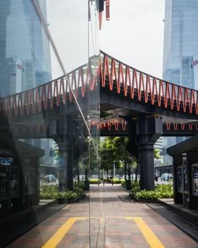Reflection of the sudirman pedestrian bridge Stock Photos
