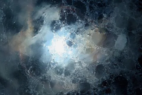 The reflection of the sun and clouds in a puddle of water. abstract backgroun Stock Photos