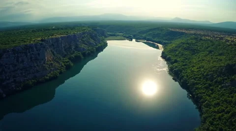 Reflection of the sun on Brljan lake Stock Footage 41555384