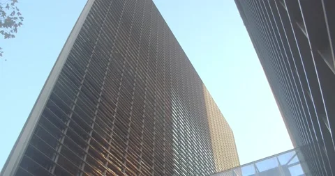 Reflection of the sun in the facade of the business center in the evening. Stock Footage 168842010