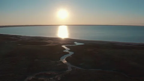 Reflection of the sun in the lake Видео 249713372