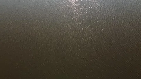 Reflection of the sun on the lake Stock Footage 258483712