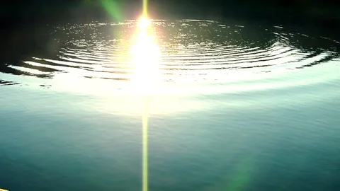 Reflection of the Sun on Lake Water Stock Footage 100228835