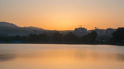 Reflection of the sun rise in Dushanbe Stock Footage 62974537