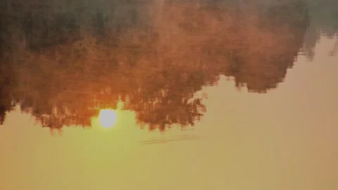 Reflection of the sun on the river with winter steam. Winter morning. Stock Footage 246526999