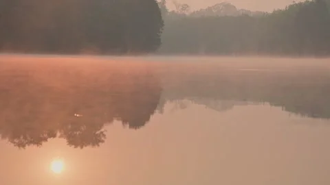 Reflection of the sun on the river with winter steam. Winter morning. Stock Footage 246527022