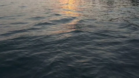 Reflection of the sun in the sea at sunset Stock Footage 212878970