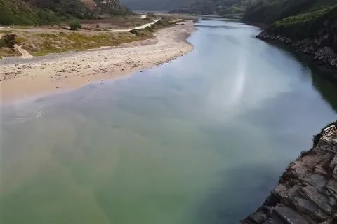 Reflection of the sun in the water. Stock Photos