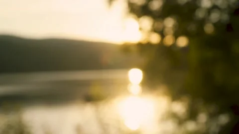 The reflection of the sun on the water at sunset in summer. Stock Footage 247923033
