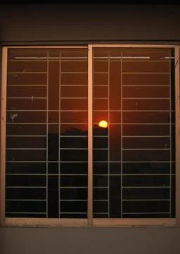 Reflection of the sun on the window glass Stock Photos