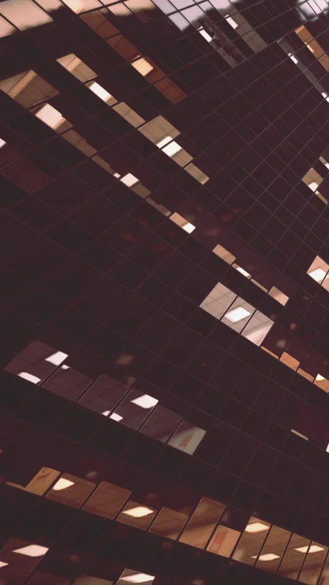 Reflection of sunlight on modern building windows in a city setting Stock Footage 340652453