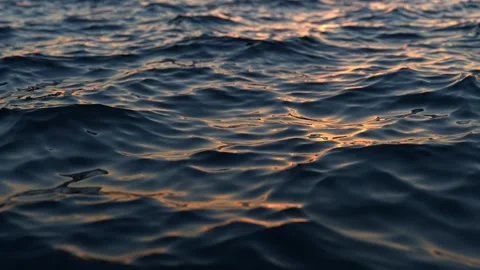 Reflection of sunlight over sea surface in slow motion Stock Footage 241716339