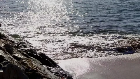 Reflection of sunlight on the surface of the ocean. Background of the shimmering Stock Footage 230721669