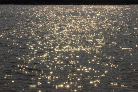 The reflection of the sunlight in the water Stock Photos