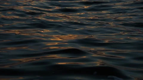 Reflection of sunlight on the water surface of the lake at dusk at sunset. Stock Footage 283082422