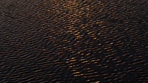 Reflection of sunlight on the water surface of a lake, sea, ocean at sunset. Stock Footage 307286310