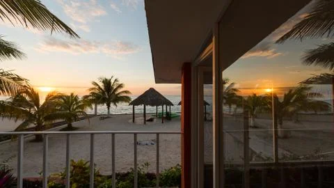 Reflection sunset caribbean beach villa Stock Photos