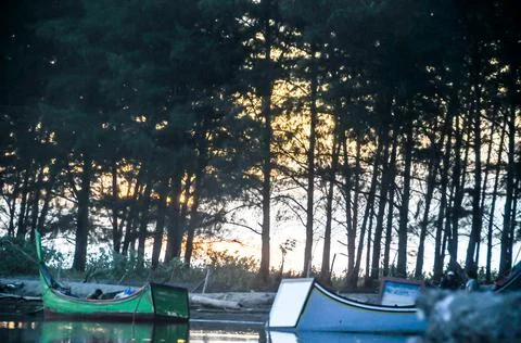 The reflection of the sunset on the fish pond Stock Photos