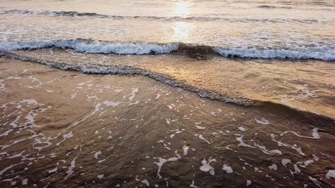 The reflection of the sunset in the sea surface Stock Footage 128839307