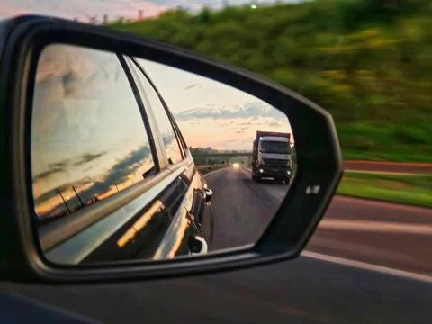 Reflection of sunset in side mirror Stock Photos