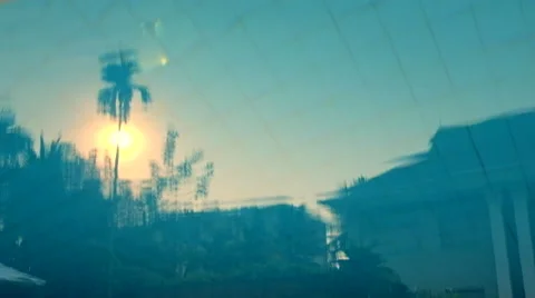 Reflection Of The Sunset In The Swimming Pool Stock Footage 48438961