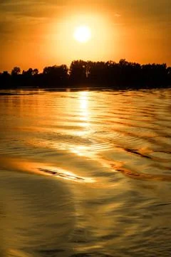 Reflection of the sunset on the watery surface. Foto stock