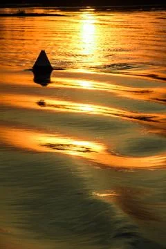 Reflection of the sunset on the watery surface. Foto stock