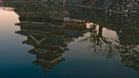 Reflection of the surface of Matsumoto Castle in Nagano, Japan Stock Footage 106348740