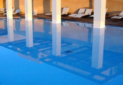 Reflection in swimming pool Stock Photos