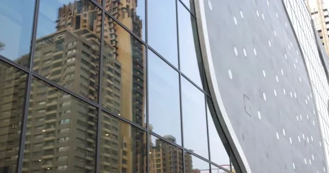 Reflection of a tall building on a window in a business district in Taiwan. Stock Footage 144205413