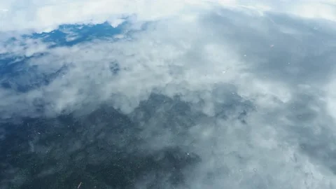 Reflection of thunderous clouds in water 스톡 동영상 143761995