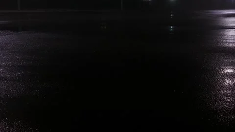 Reflection from traffic lights on wet asphalt at night in autumn. Copy space for Stock-Footage 297850870