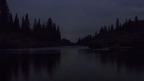 Reflection of Trees In River, Northern Maine, Dusk-Day Long 4k Time Lapse (30) Stock Footage 93590463