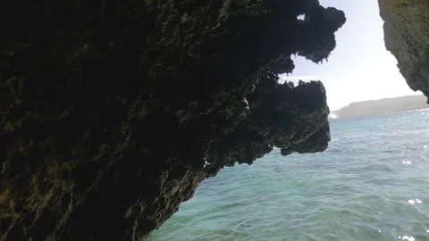 Reflection of the turquoise water on the natural rock, in the Philippines Stock Footage 235509571