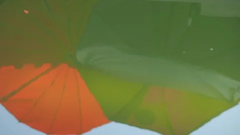 The reflection of the umbrella in the pool. Stock Footage 125257251