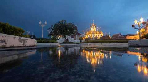 Reflection of Wat Ratchanatdaram Temple the beautiful golden castle or pagoda Stock Photos
